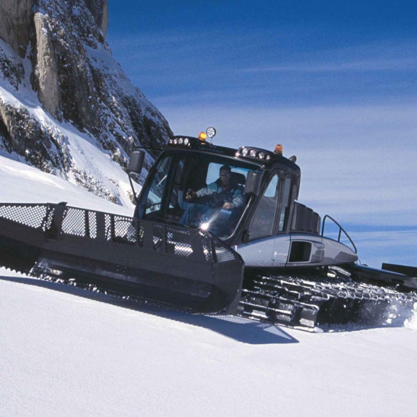 Rubber tracks for snowmobiles